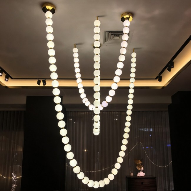 Nowoczesna lampa wisząca Dorado Rope Led złota z białymi kulkami - CCT